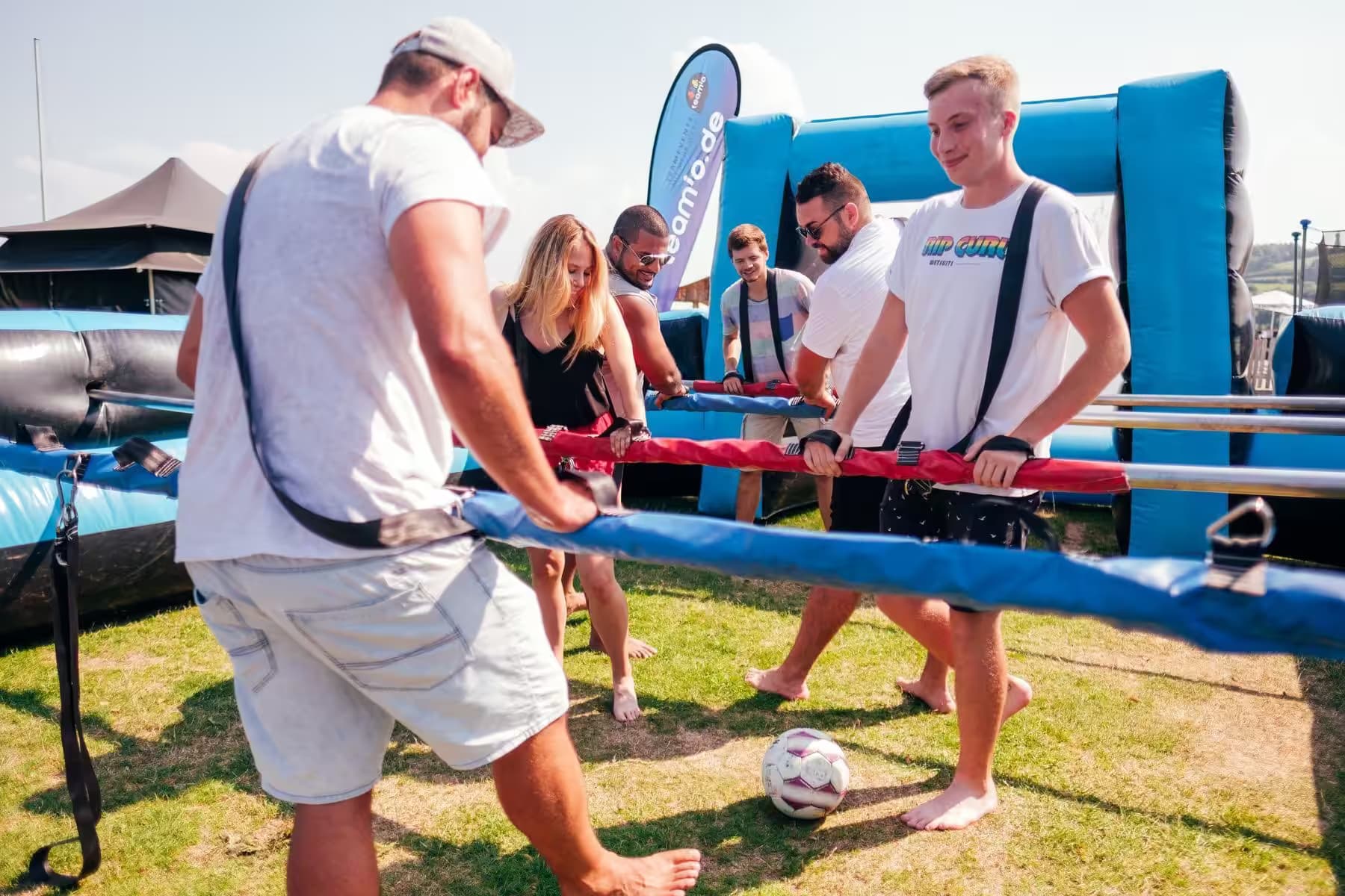 Giant human table football team event