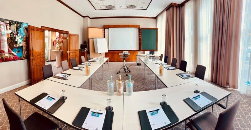 Meeting room at the Parkhotel Engelsburg with tables arranged in a U shape