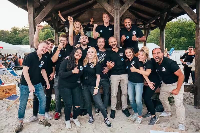 The teamio team at an outdoor event together